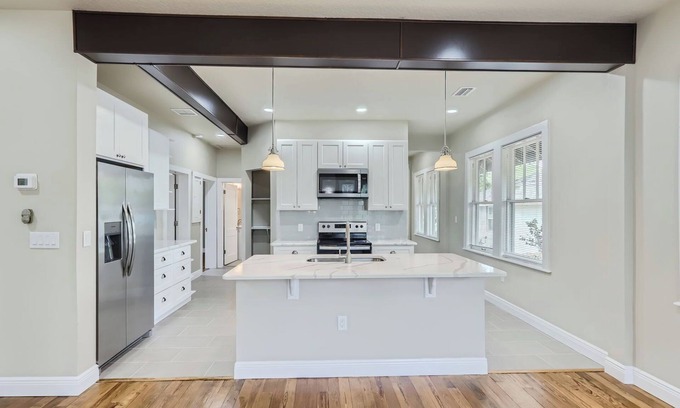 Titusville House | Charming 3-bedroom under ancient oak trees in Titusville