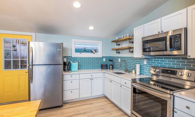 Pigeon Point Cottage | Charming Cottage with Outdoor Entertainment Center