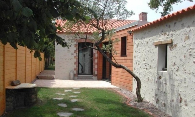 Saint-Brevin-les-Pins Cottage | Charming Stone Cottage Near Beaches with Enclosed Garden and Sports Amenities