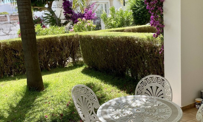 Praia da Luz Apartment | Charming garden apartment with generous verandah, 3 minutes walk from beach.