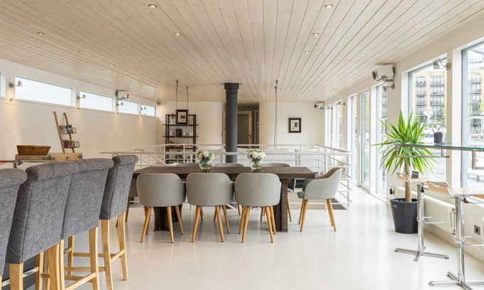 Tower Hill Boat Rental | Charming houseboat featuring a sauna