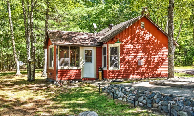 Eagle River Cabin | Charming, lakefront home with a gas fireplace, docks, firepit, & full kitchen