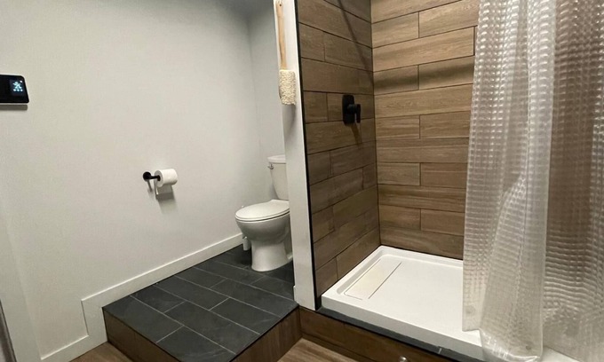 Algoma District Apartment | Charming Prohibition-Era Speakeasy Lounge with Bedroom and Commercial Kitchen