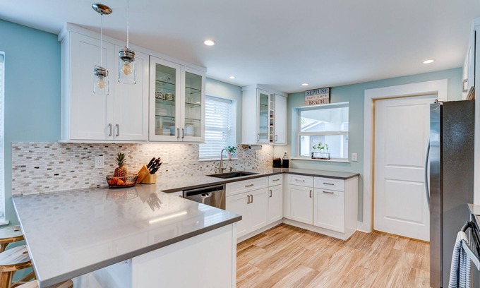 Neptune Beach House | Cheerful 3/2 bungalow - 1,000ft to the sand!