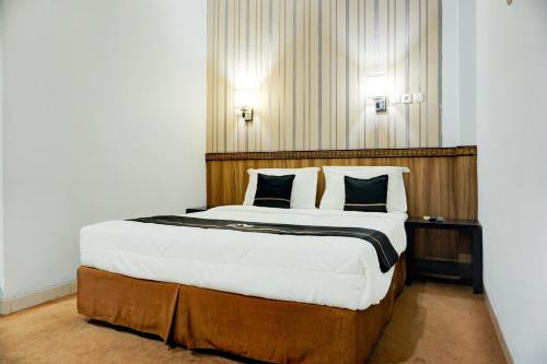 Palembang Hotel | Collection O R.Sukamto Near Palembang Trade Center Mall