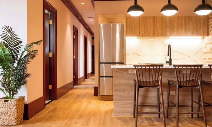 New Orleans Hotel | Colorful 4BR Suite w/Pool steps to St. Charles Ave!