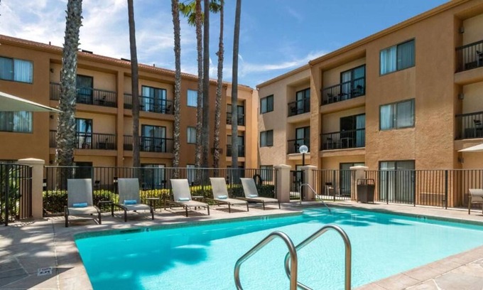 Downtown Village House | Comfort and Convenience! Spacious Unit with Pool View, Outdoor Pool, Parking