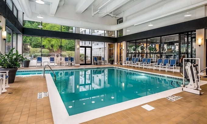 Executive Park Hotel | Comfort and Convenience! 3 Convenient Units, Pet-Friendly, Parking, Pools!
