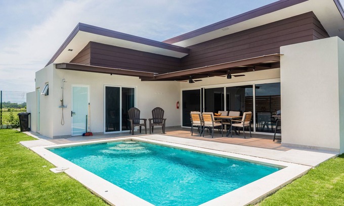 Esterillos Este House | Comfortable coastal retreat with pool, gas grill & near-beach location
