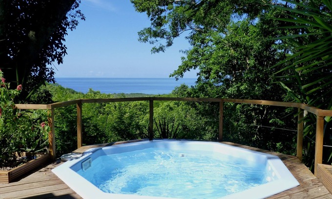 Vieux-Habitants House | Comfortable cottage with superb sea and mountain views
