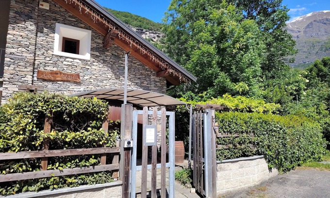 Novalesa Apartment | Comfortable detached apartment with garden and balcony.