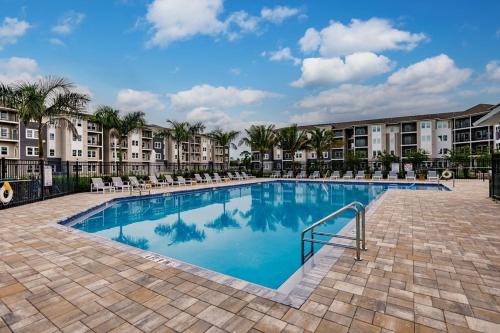 Fort Myers Apartment | Community oasis with pool & gym access