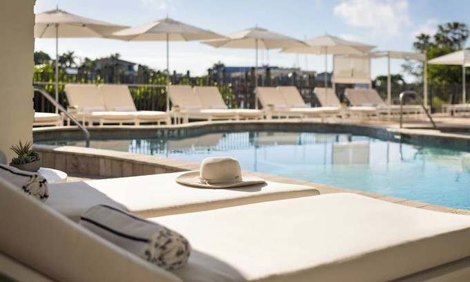 St. Pete Beach Hotel | Convenience & Comfort! 4 Relaxing Units! Pool, Pets Allowed, Rooftop Bar!