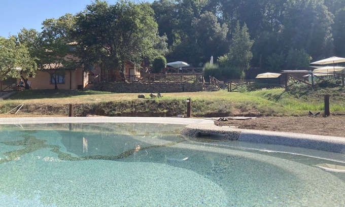 Castagneto Carducci Villa | Cosy apartment in villa for 4 guests with pool, WIFI, A/C, TV, patio and pets allowed
