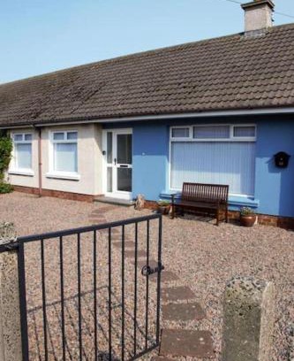 Portballintrae House | Cosy Coastal Cottage in Portballintrae