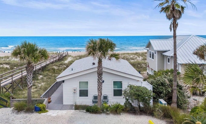 Ocean Cay House | Cottage by the Sea features front row views of the beautiful beach and Atlantic Ocean.