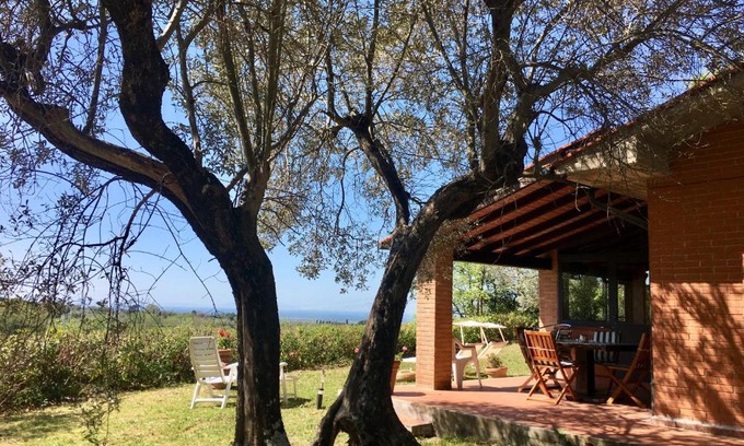 Guardistallo House | Cottage Gaia with sea view, fenced garden by ToscanaTour