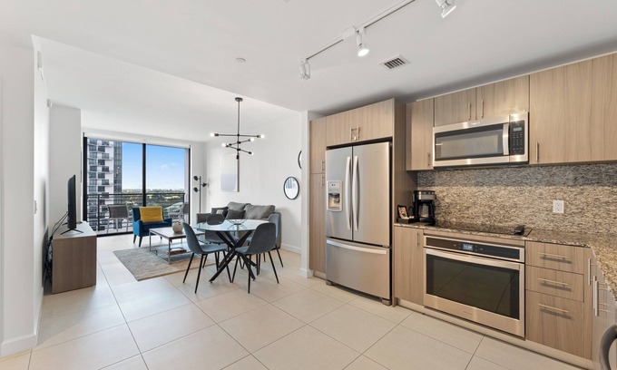 Doral Condo | Cozy 1-bedroom condo with WiFi, fitness room in enchanting Downtown Doral