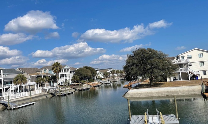 Ocean Isle Beach Cottage | Cozy 5BR-2BA Cottage on Canal, Private Heated Pool, Private Boat Dock