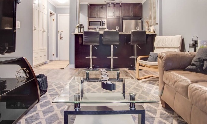 Eau Claire Condo | Cozy and Central DT Home w Gym Coffee Parking BBQ!