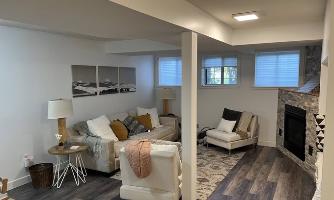Cedarbrae House | Cozy basement suite w/fireplace. Pet friendly!