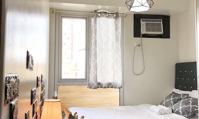 Bagong Lipunan Ng Crame Condo | Cozy City Themed Room with 16mbps WIFI
