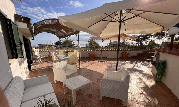 Marina di Fuscaldo Apartment | Cozy cottage with veranda and garden 800 meters from the sea