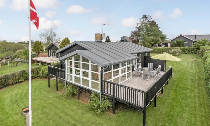 Diernæs House | Cozy cottage with a bright and beautiful heated winter garden.