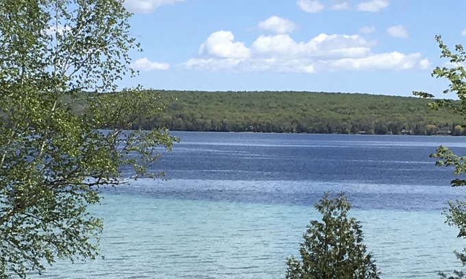 Kewadin Cottage | Cozy family cottage on lake; private, quiet retreat available for monthly rental
