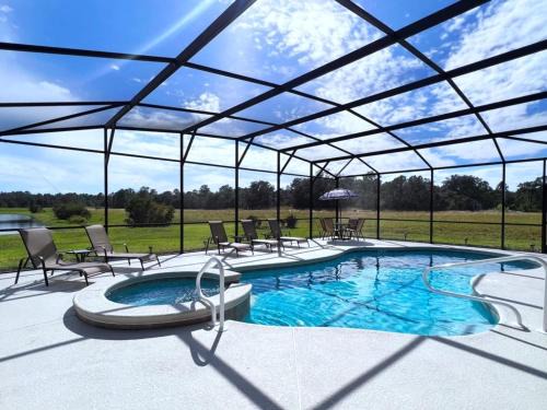 Watersong House | Cozy Family Friendly Pool Home with Game Room home
