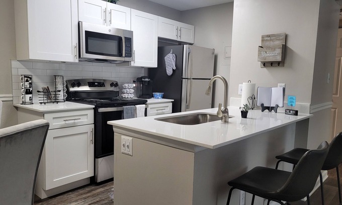 Ashbrook - Clawson Village Apartment | Cozy Spot close to Uptown QC!