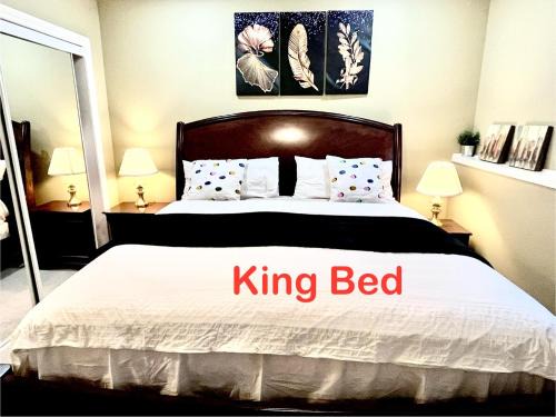 Southwest Calgary House | Cozy Walkout suite with King bed, Kitchen, Parking & Patio