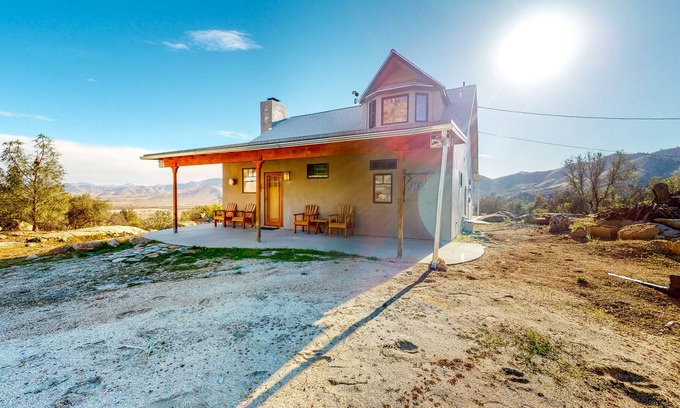 Weldon House | Custom-crafted acreage with sunroom & clawfoot tub