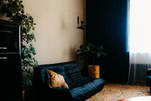 Centrs Apartment | Dark & Moody Mid Century Apartment