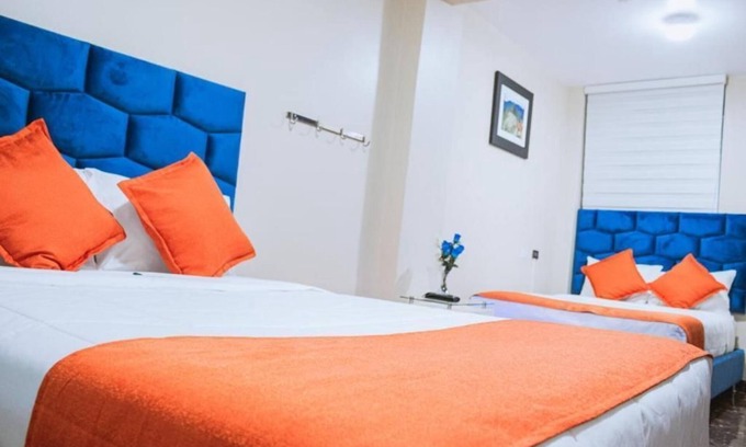 Santiago de Surco Apartment | Deluxe Queen Room with Two Queen Beds 2