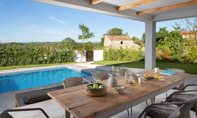 Cepljani House | Designer villa in a modern style with a pool and a generous garden