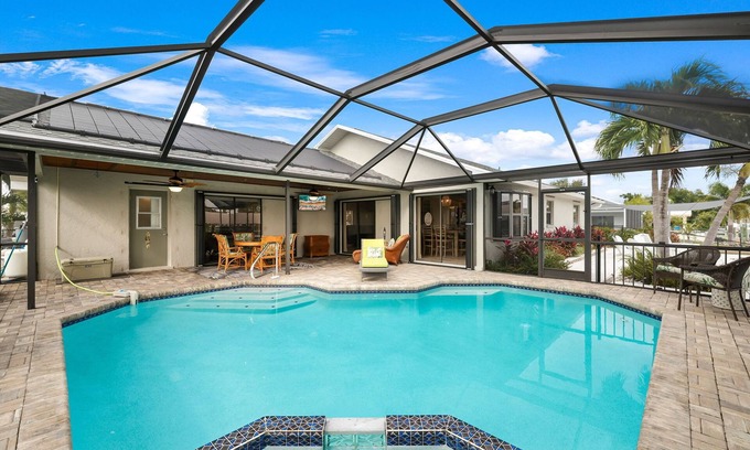 Lochmoor Waterway Estates House | Direct Gulf Access Newly Renovated Waterfront Pool Home Retreat