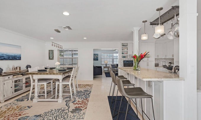 Lake Park House | Discover your perfect Naples getaway 1.2 miles from Lowdermilk Park Beach