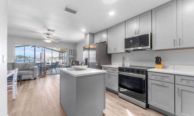 Flor-a-mar House | Dockside Delight! Waterfront Home + Boat Slip for Your Next Getaway