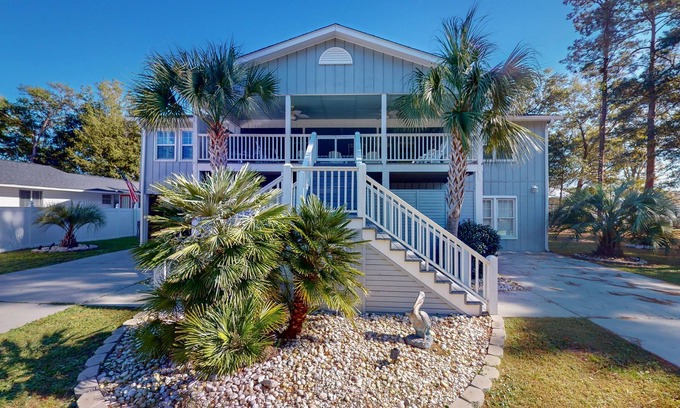 Ocean Isle Beach House | Dog-friendly, 8 minutes to beach with shared pool, covered patio, & big backyard