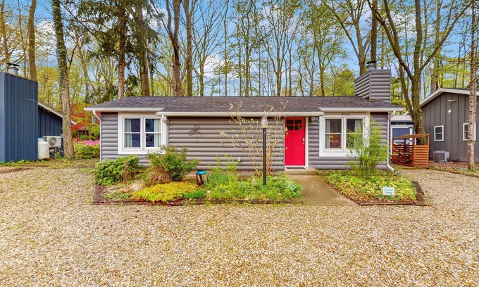 Lakeside House | Dog-friendly cottage with private beach, screened porch, wood fireplace & AC