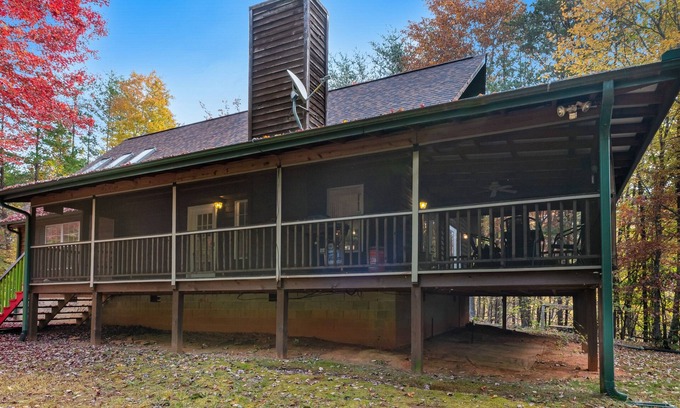 Mill Spring Cabin | Dog-friendly home with deck, shuffleboard, firepit - close to outdoor activities