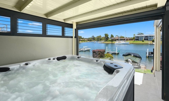 Port Macquarie House | Dolphin Way On The Canal - outdoor spa, private jetty