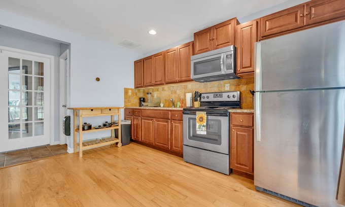 Buford House | Downstairs Unit - Pool + Tennis Access + Patio