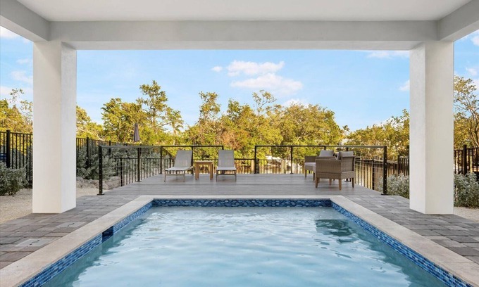 Cortez House | Edgewater Escape: Luxury Eco Canal-Front Home Near Beach with Pool & Dock