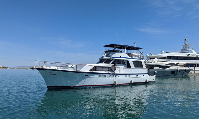 La Paz Boat Rental | "El Don" is a 65ft Classic Hatteras luxury yacht docked in La Paz, Mexico.