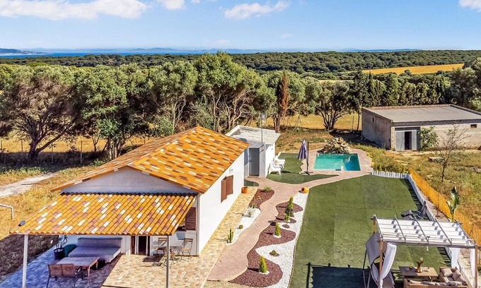 Brena y Marismas de Barbate Natural Park House | Enjoy an unforgettable vacation in this inviting vacation home with pool.