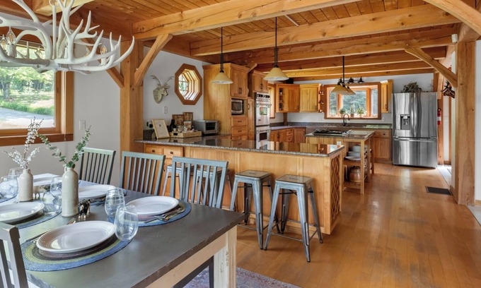 Lower Village House | Enjoy fall foliage from the hot tub!