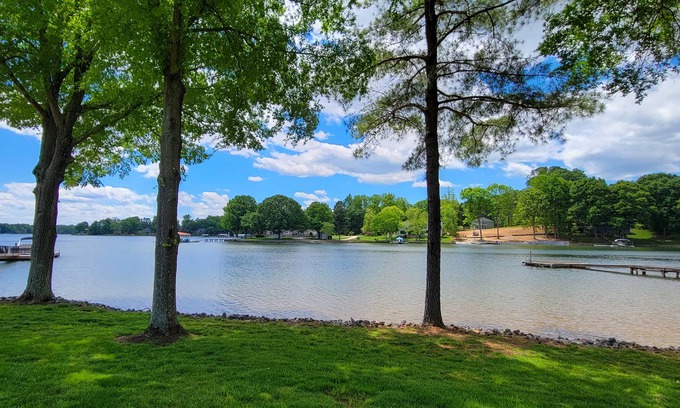 Troutman House | Enjoy the beauty of lake life in this waterfront home .
