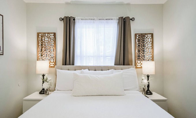 Shady Acres House | Enjoy two separate, fully furnished homes on one property — perfect for large groups. The front home offers 3 bedrooms and 1 bath, while the back two-story home features 3 bedrooms, 2 baths, and an upstairs family room with 2 beds